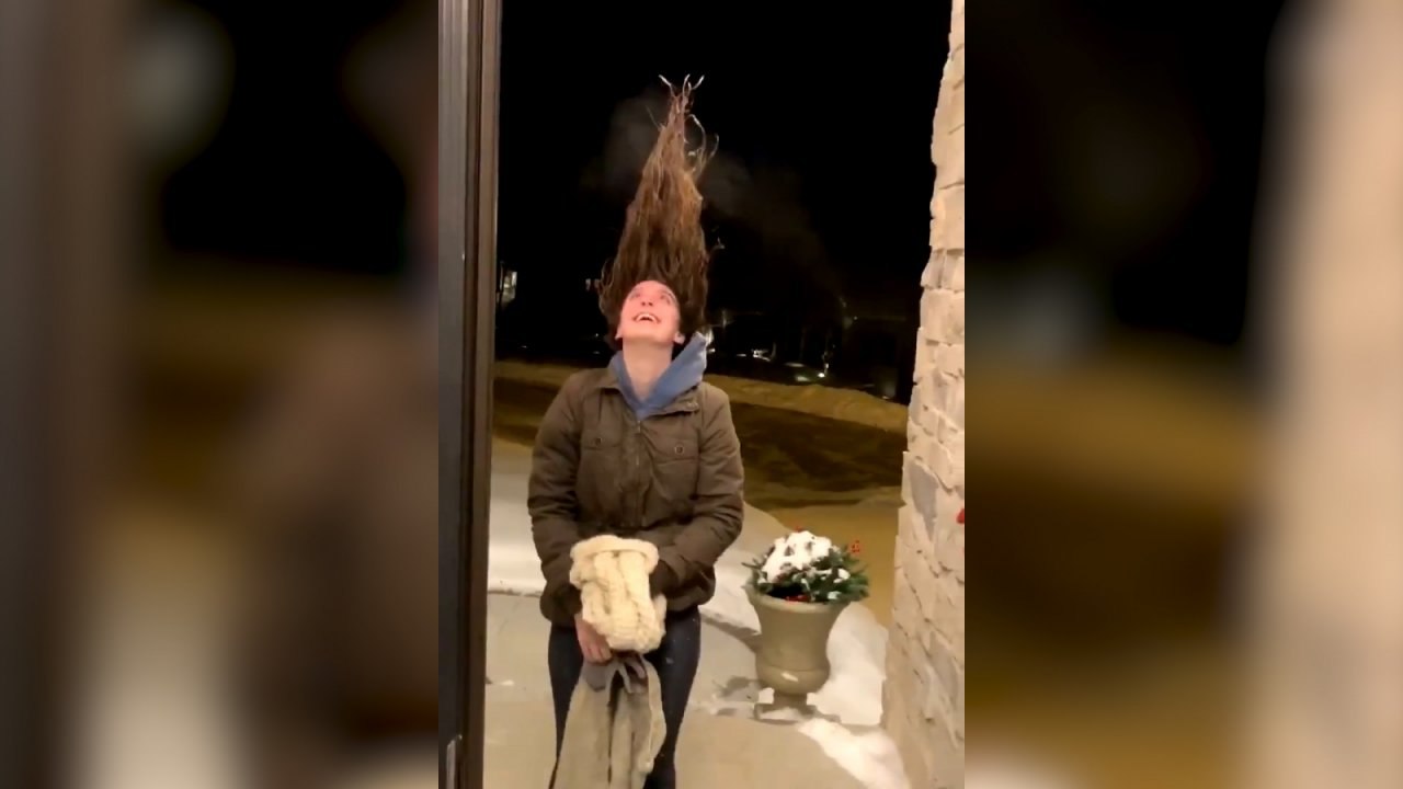 Watch: Woman's Weather Experiment Makes Hair St...