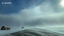 Incredible footage shows rare sun dog phenomenon during polar vortex on US highway