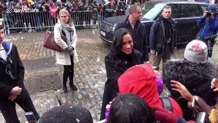 Prince Harry and Meghan Markle meet Bristol well-wishers in the snow