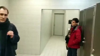 Woman goes for a piss in the men's bathroom
