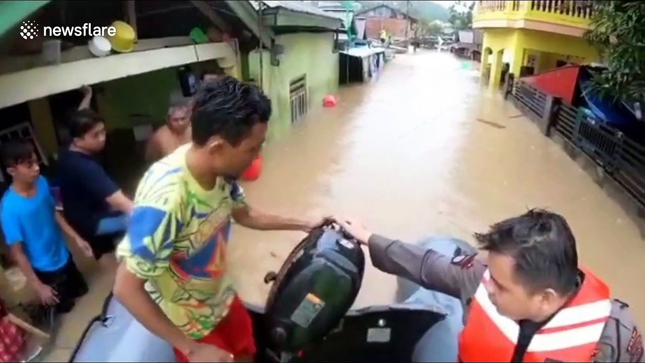 Teams rescue residents hit by severe flash floods in Indonesia