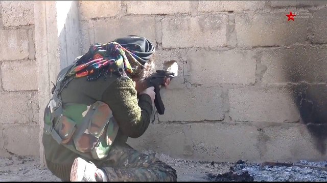 Syria war: Kurdish fighters battle ISIL in its last controlled area