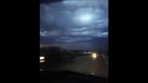 During a storm in Iowa witness several UFOs