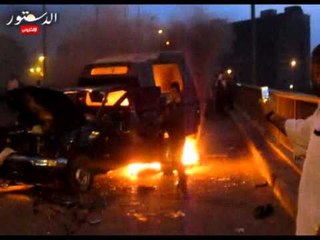 "ثورجي" يقطعون كوبرى أكتوبر ويحرقون سيارة شرطة