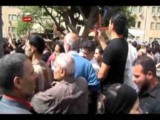 أقباط يتوجهون بمسيرة الاتحادية بعد تشييع جثمان أقباط الخصوص