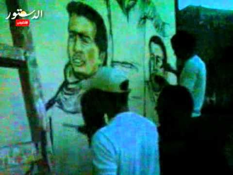 رسم جرافيتي معتقلي 6 ابريل علي سور الامريكيه