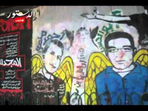 جرافيتى لشهيد حملة تمرد على سور الجامعه الامريكيه