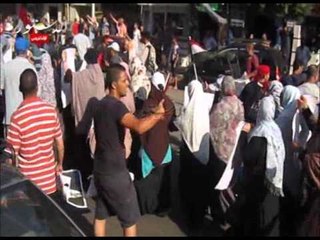 شاهد حرب شوارع بين أهالى الدقي والإخوان