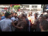 انصار السيسي يطردون متظاهرون يتهفون ضد الجيش من محيط دار القضاء