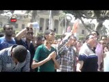 طلاب الإخوان يتسلقون أسوار جامعة القاهرة وأطفال يشاركون فى التظاهرات