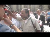 خناقة بين مؤيدى ومعارضى باسم يوسف أمام دار القضاء