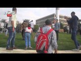 أنصار السيسي يتظاهرون ضد طلاب المحظورة بميدان النهضة