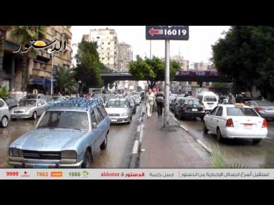 شاهد..شوارع القاهرة تغرق فى مياه الأمطار وتوقف حركة السيارات