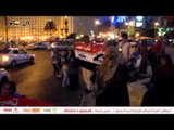العشرات يتوافدون على ميدان التحرير للاحتفال بافتتاح قناة السويس