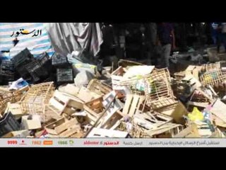 بائع بحلوان يشعل النار في بضاعته أمام قوات الأمن