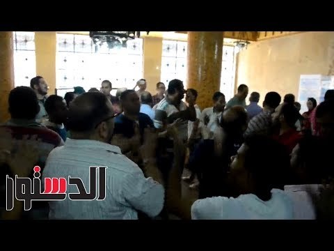 الدستور | «وقفة» إحتجاجية لـ العمال داخل مبنى إتحاد عمال مصر