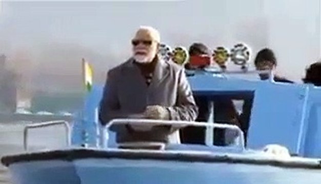PM Modi waves at an empty Dal lake at Kashmir.