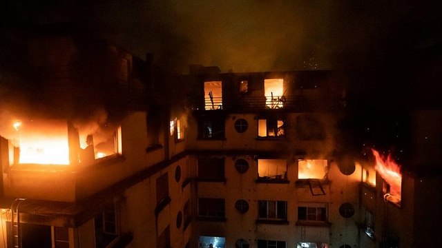 Paris apartment fire: French capital 'in mourning' after 10 killed in blaze