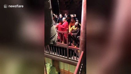 Shaolin monks ring ceremonial bell to welcome the Year of the Pig