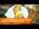 Disfrute de una empanada de 50 cm acompañada de morocho en La Jota