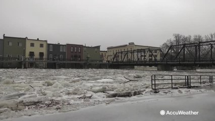 Residents evacuate after ice jam floods river