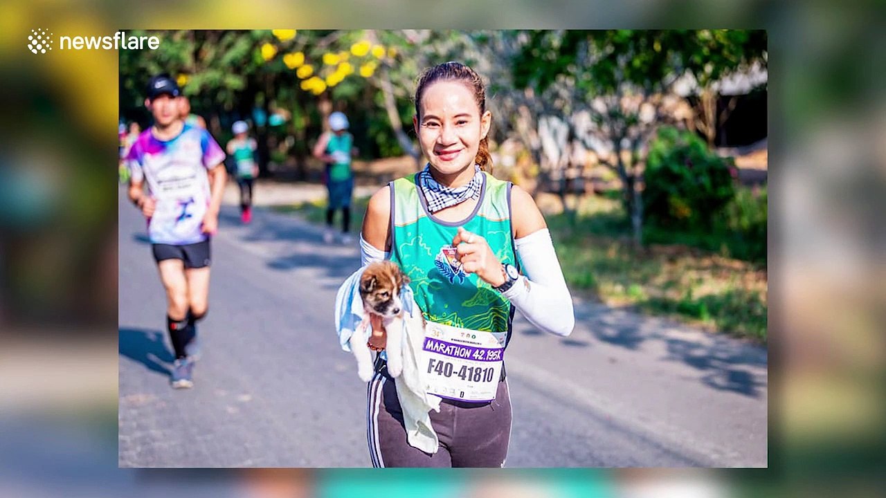 Now the hero runner who rescued puppy during marathon has ADOPTED the pooch
