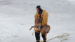 Firefighters Rescuing Dogs From Icy Waters