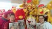 Lions and dragon bring good fortune to newspaper’s bureau office
