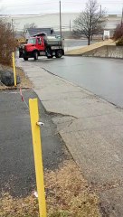 Slippery Roads Cause Truck to Tip