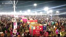 Twenty million Hindu devotees gather to bathe at Kumbh mela