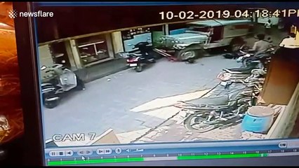 Miraculous escape for woman and baby after jeep knocks them down on busy street in southern India