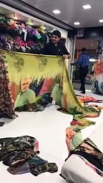 Surat traders gets printed PM Modi's face on sarees, video goes viral- Tv9