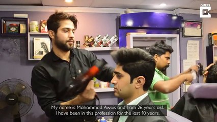 Pakistani Barber cuts hair using 27 scissors at a time- Tv9