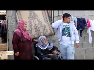 Şerîf Omerî alîkariya penaberên Domîz dike