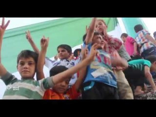 شاهد كيف رفع أهالي مدينة الباب أكبر علم للثورة في مدينتهم