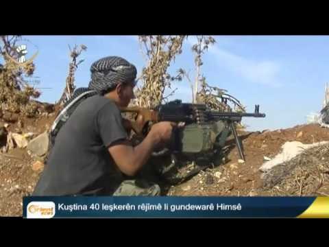 Hêzên demoqratîk gundekî li Eyn Îsa kontrol dike