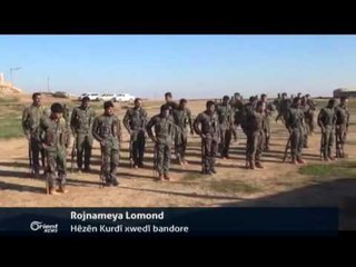 Hêzên Demoqratîk Li pêş deriyê balefixaneya Minix ya leşkerî ne