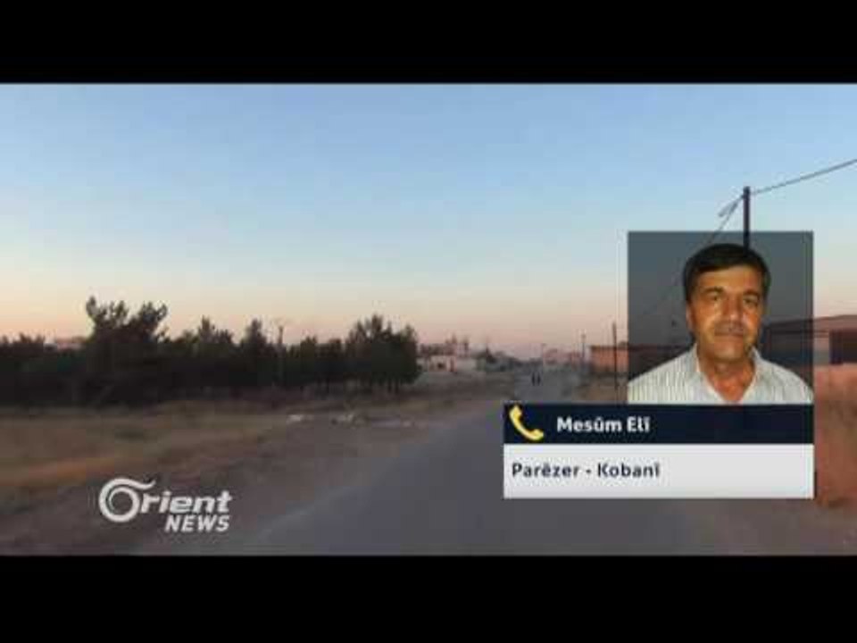 Salek li ser roja reş roja kumkujiya Kobanî derbas dibe