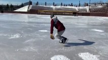 Baseball player trades cleats for ice skates after field becomes icy