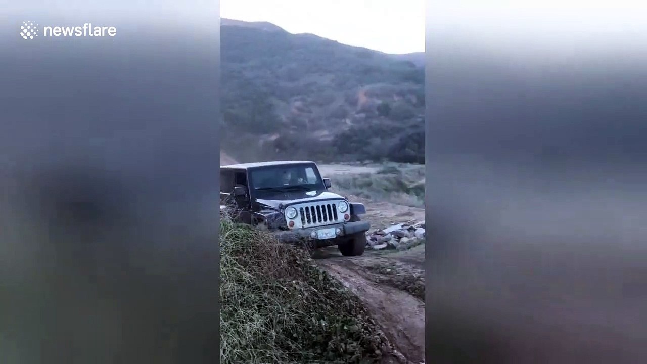 Hardtop Jeep turns into instant convertible after jump fail