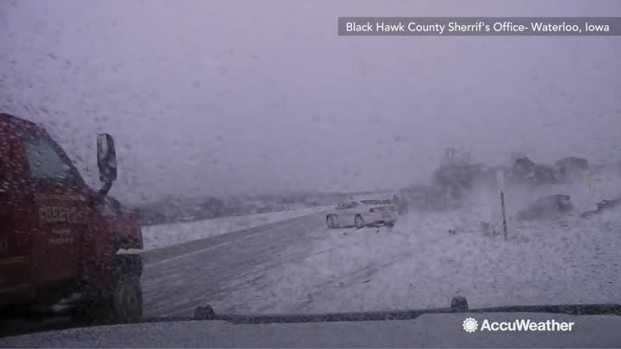 Car loses control on snowy road, plows into police car
