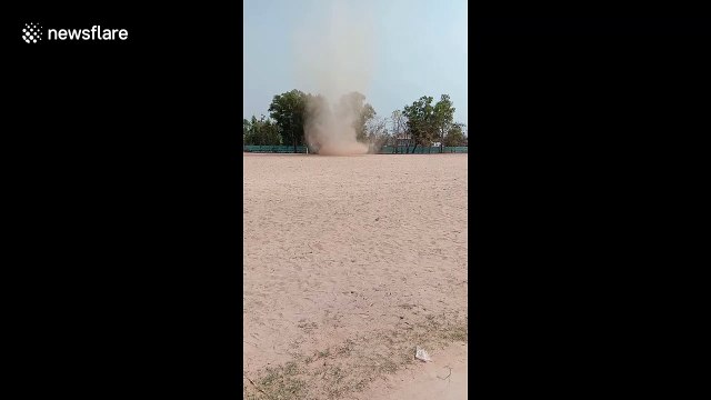 Children flee as mini tornado whips through school field in Thailand