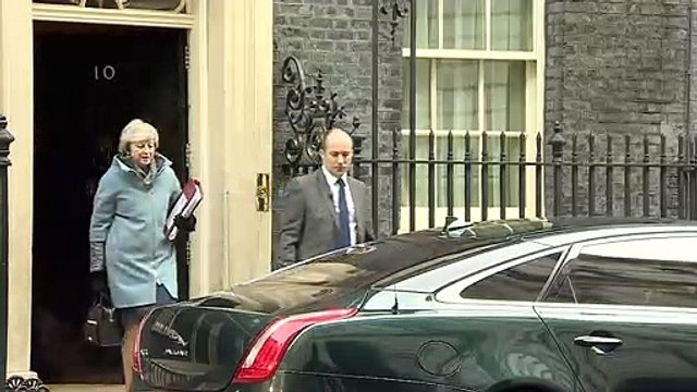 Theresa May departs Downing Street ahead of PMQs