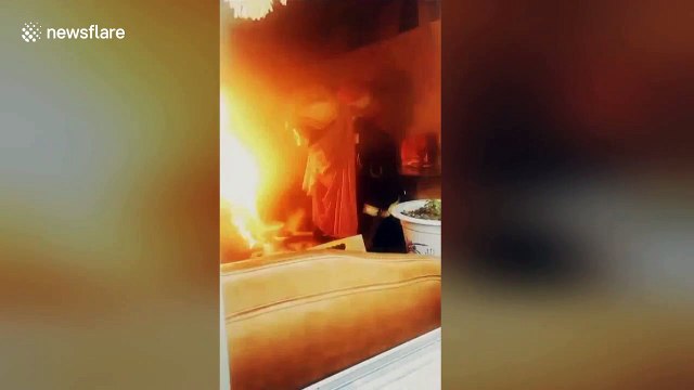 Heroic fireman risks life to drag burning gas cylinder out of house