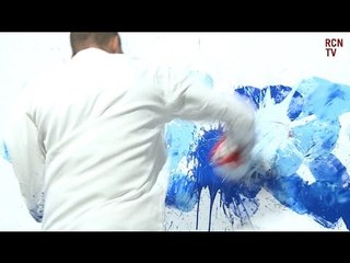 Boxer Punches A Painting