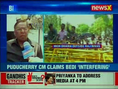 Puducherry CM Narayanasamy stages protest against Kiran Bedi, claims day to day govt. work stalling