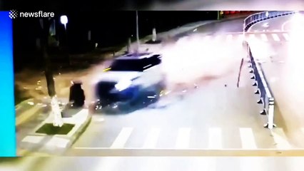Man jogging on roadside has miraculous near miss from out-of-control car
