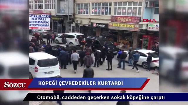 Otomobilin altına sıkışan köpeği çevredekiler kurtardı