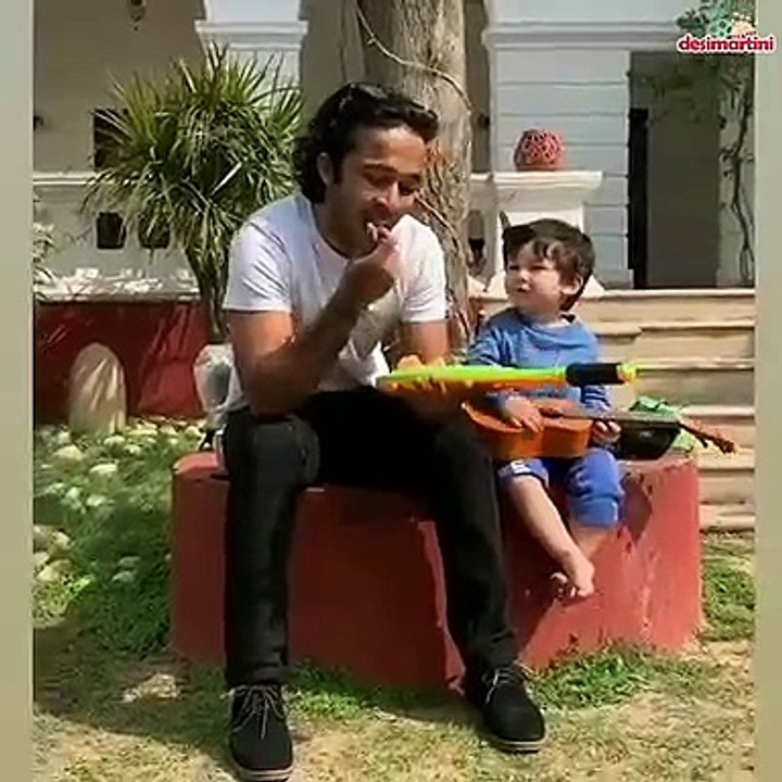 Taimur  honing his ukulele skills