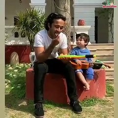 Taimur  honing his ukulele skills